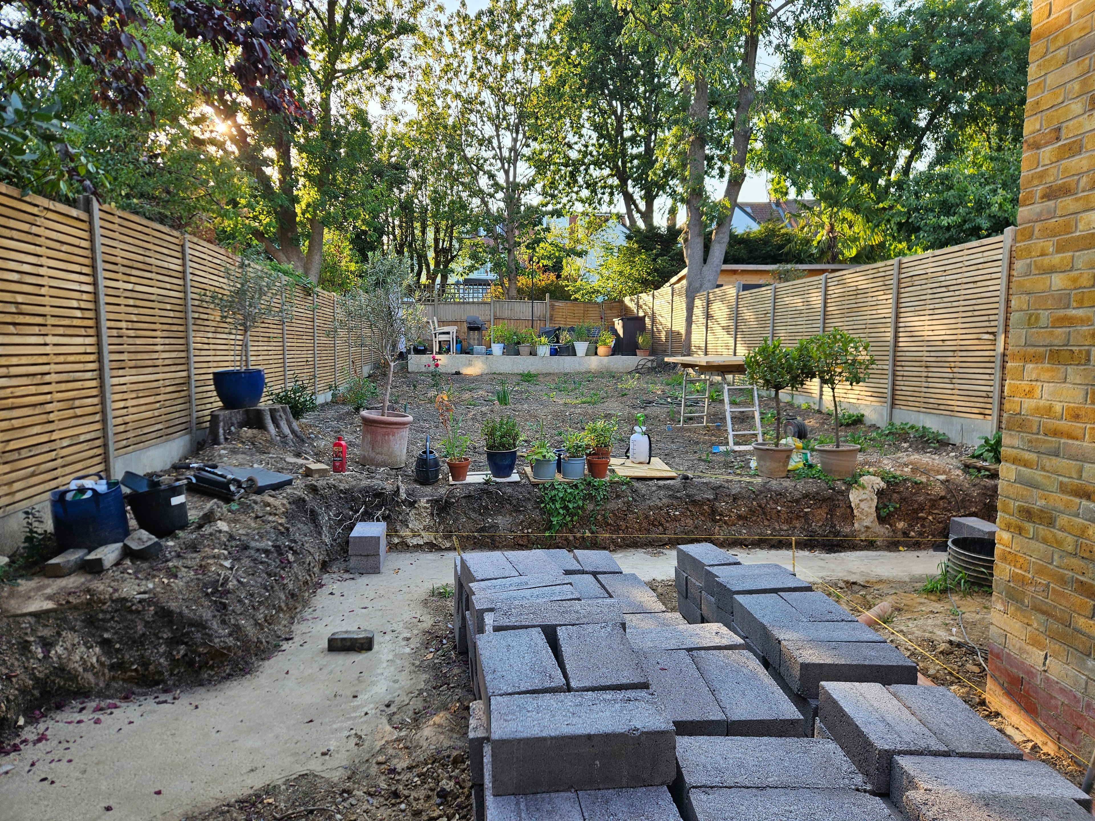 Concrete base poured, blocks delivered