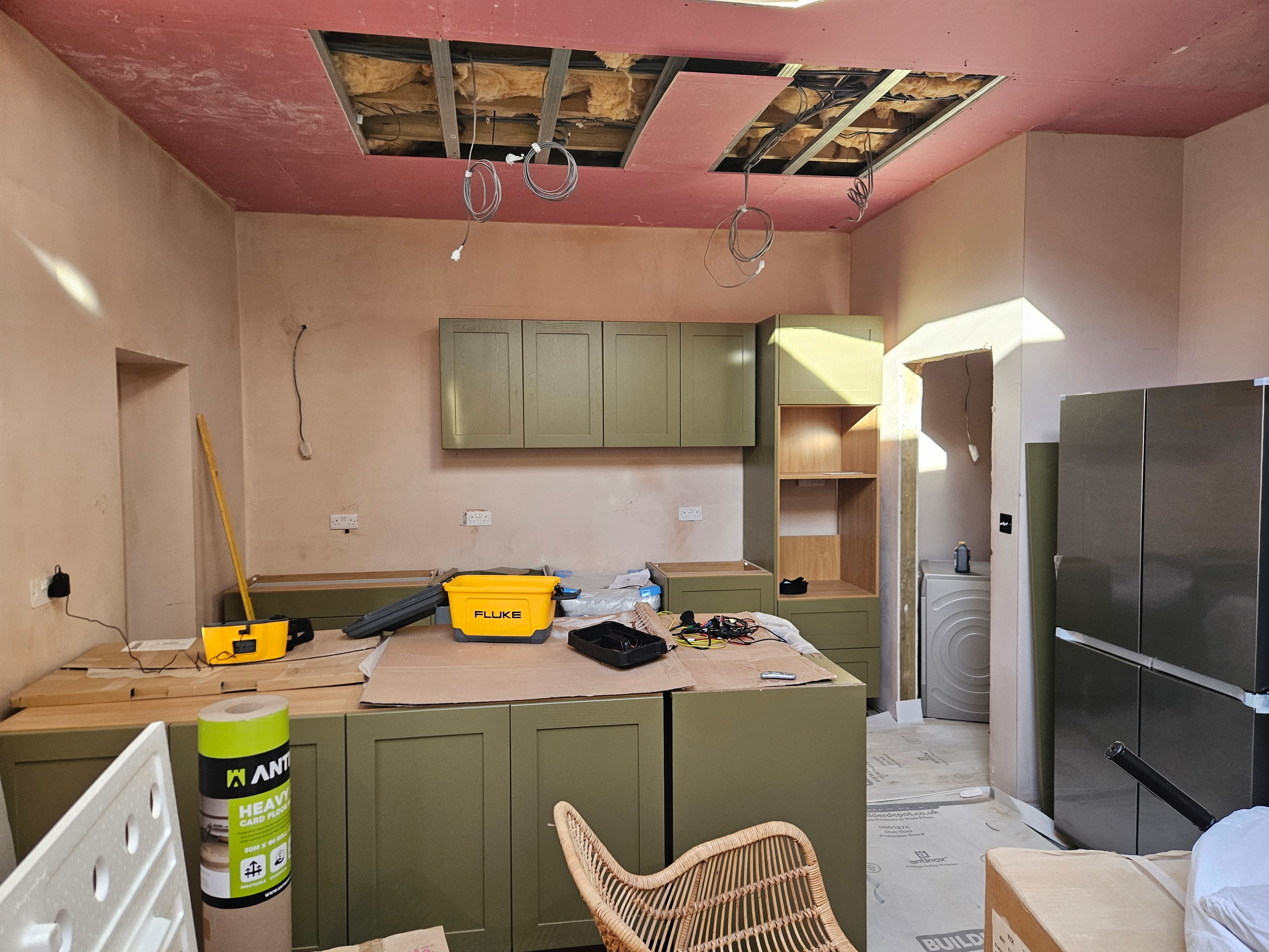 More progress, ceiling open for electrics, island in place