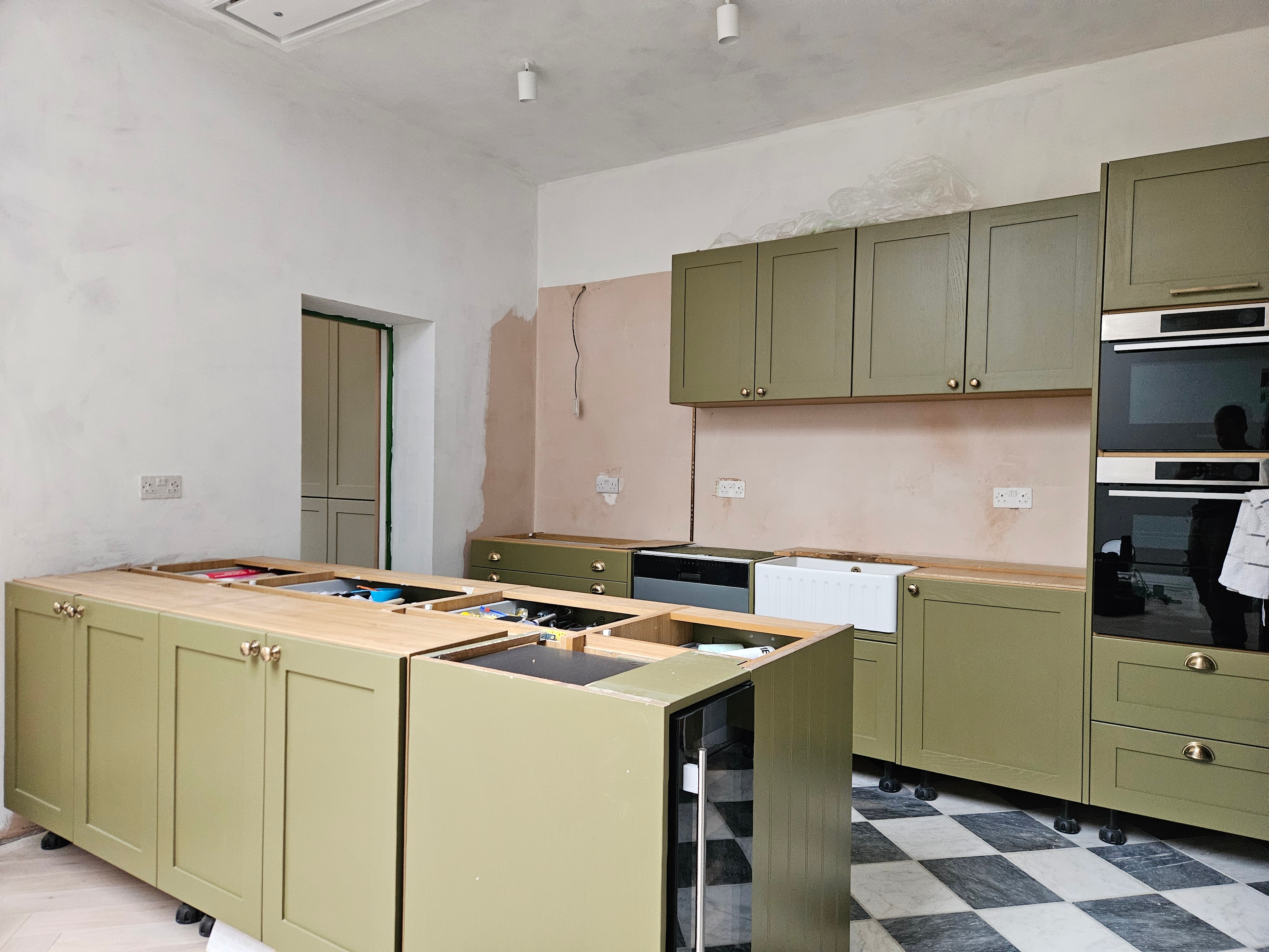 Cabinets installed with oak worktops on island