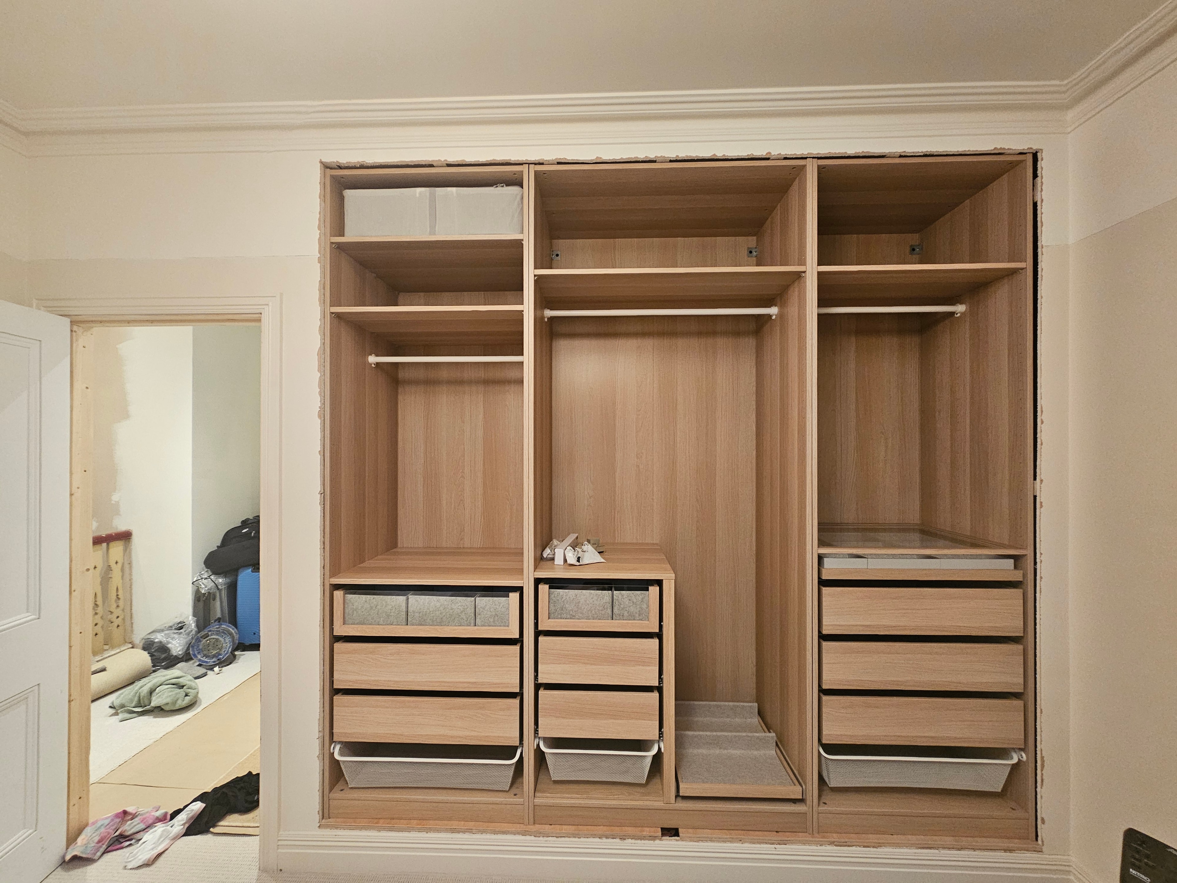 Internal shelves, rails and drawers fitted